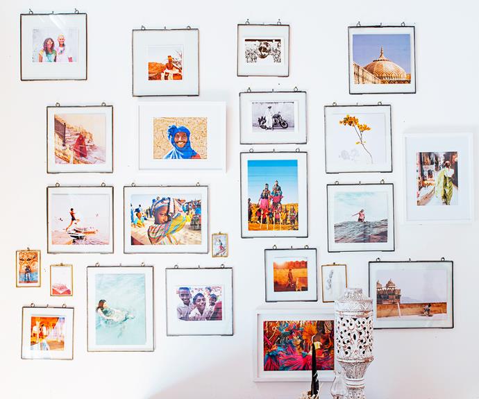 travel photos on a feature wall