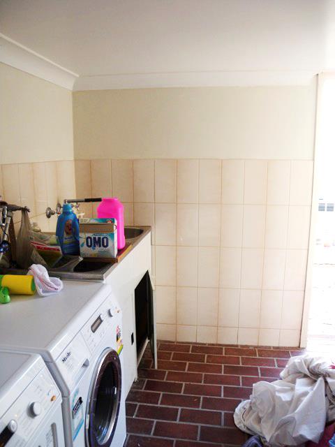 **Before:** The laundry design was outdated and impractical, and was only accessible from the garden.