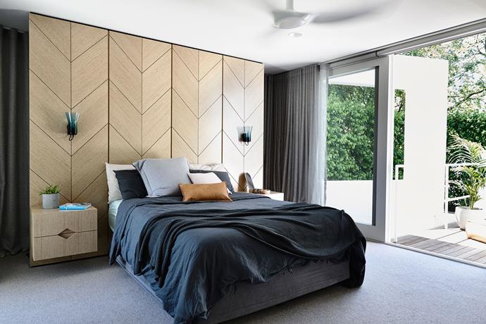 Suite Dreams by [Doherty Design Studio](http://dohertydesignstudio.com.au/|target="_blank"). 
This newly reconfigured Melbourne master bedroom provides its owners with a space that functions as a retreat from the rest of the home and incorporates distinct sleeping, dressing and bathing zones. “We embraced home’s original 1980s architecture,” says Mardi. “The bespoke joinery, the colour blocking and geometric details all provide a nod to the home’s ‘80s aesthetic.” *Photography by Derek Swalwell.*