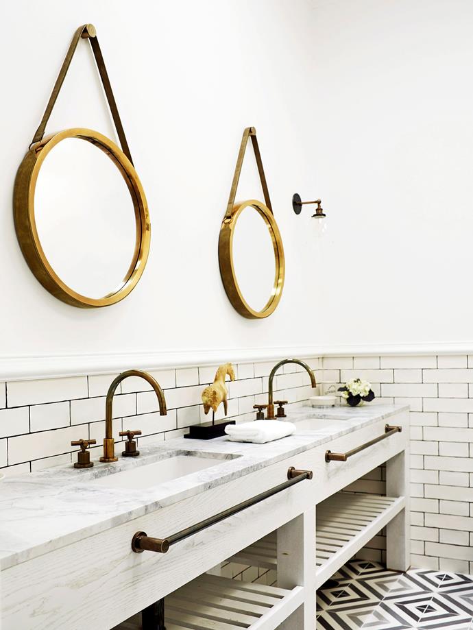 **Double up.** A dual vanity always delights, but it's the nautical accessories and rustic, brass accents that really bring this bathroom to life. *Photo: Sean Fennessy / bauersyndication.com.au*