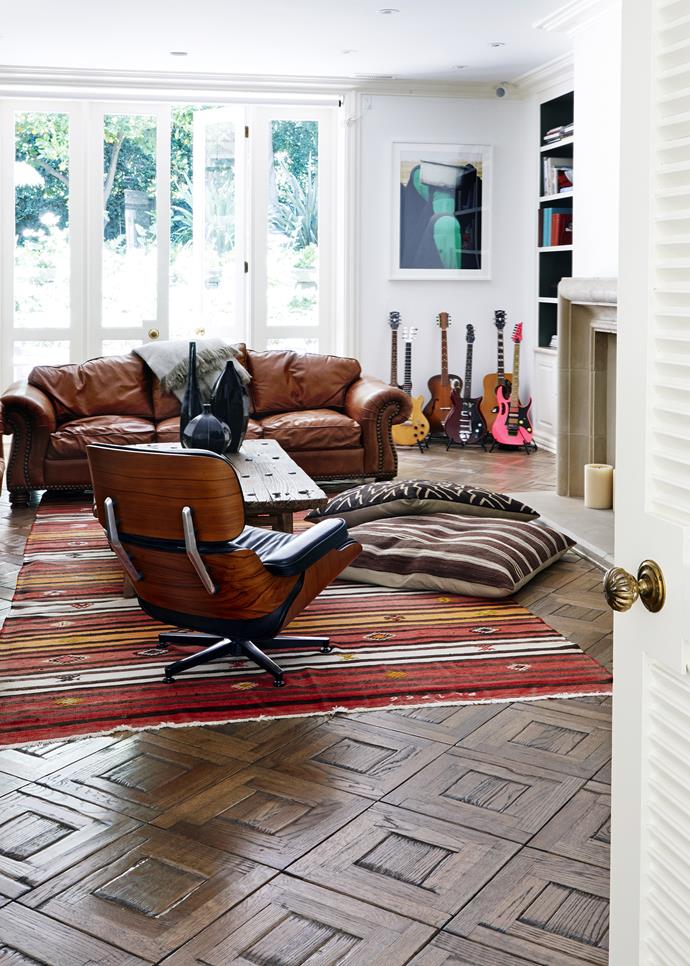 Parquet flooring, which is found in many rooms in the home, is a charming original feature. Large Moroccan floor cushions plonked on the floor create cool informal seating.