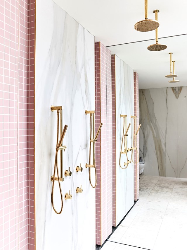 TV presenter and style guru Bec Judd was responsible for the design of this Pinterest-worthy bathroom featuring Millennial pink feature tiles, swathes of marble and glitzy gold tapware. After failing to sell, [Bec gave the house a complete overhaul](https://www.homestolove.com.au/becca-and-chris-judd-are-auctioning-off-their-townhouse-4367|target="_blank"), documenting the progress in a video series, which she posted on her blog [Rebecca Judd Loves](http://www.rebeccajuddloves.com/|target="_blank"|rel="nofollow"). They say kitchens sell houses but in this case, we're sure this bathroom sealed the deal.