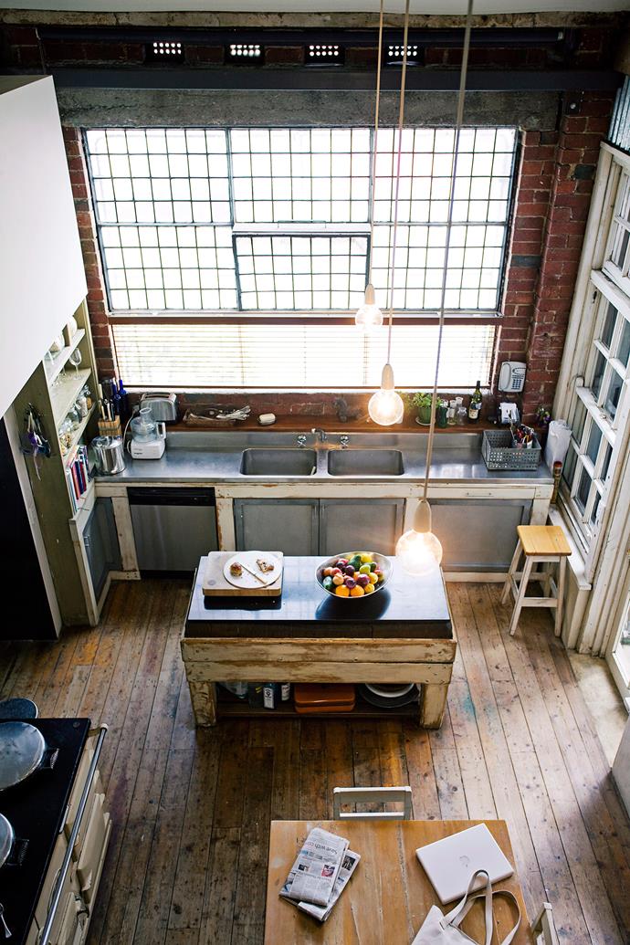 NYC is known for its loft apartments, converted from former factories. This kitchen combines industrial stainless steel with rustic timber for a truly eclectic space. *Photo: James Geer / bauersyndication.com.au*