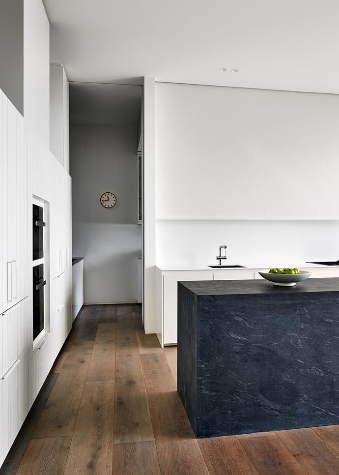 The simple, elegant kitchen has Pietra Del Cardosa stone on the island bench, and Arctic Oak engineered floorboards from [Profile Timber Floors](http://www.profiletimber.com.au/|target="_blank"|rel="nofollow").