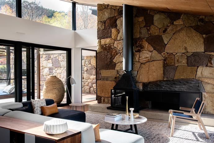 The stone was quarried on site with bulldozers dispatched upwards to harvest “car-sized chunks that had fallen off the escarpment”, explains Ben of the beautifully crafted dry-stone walls by J&J Stonewall Constructions that back the pods and define the living room and outdoor dining spaces.