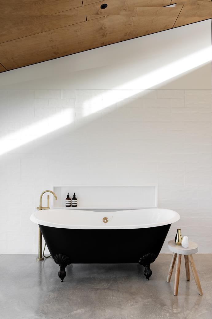 The vintage bath was found by the owners and restored - perfect for the modern-country aesthetic.