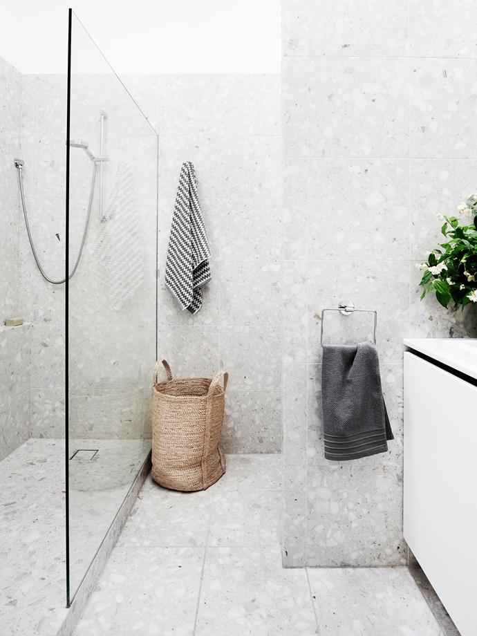 In the bathroom, the existing shower cubicle was converted into a laundry area and a new walk-in shower installed. In keeping with the home’s 1970s sensibilities, terrazzo tiles were laid from floor to ceiling.