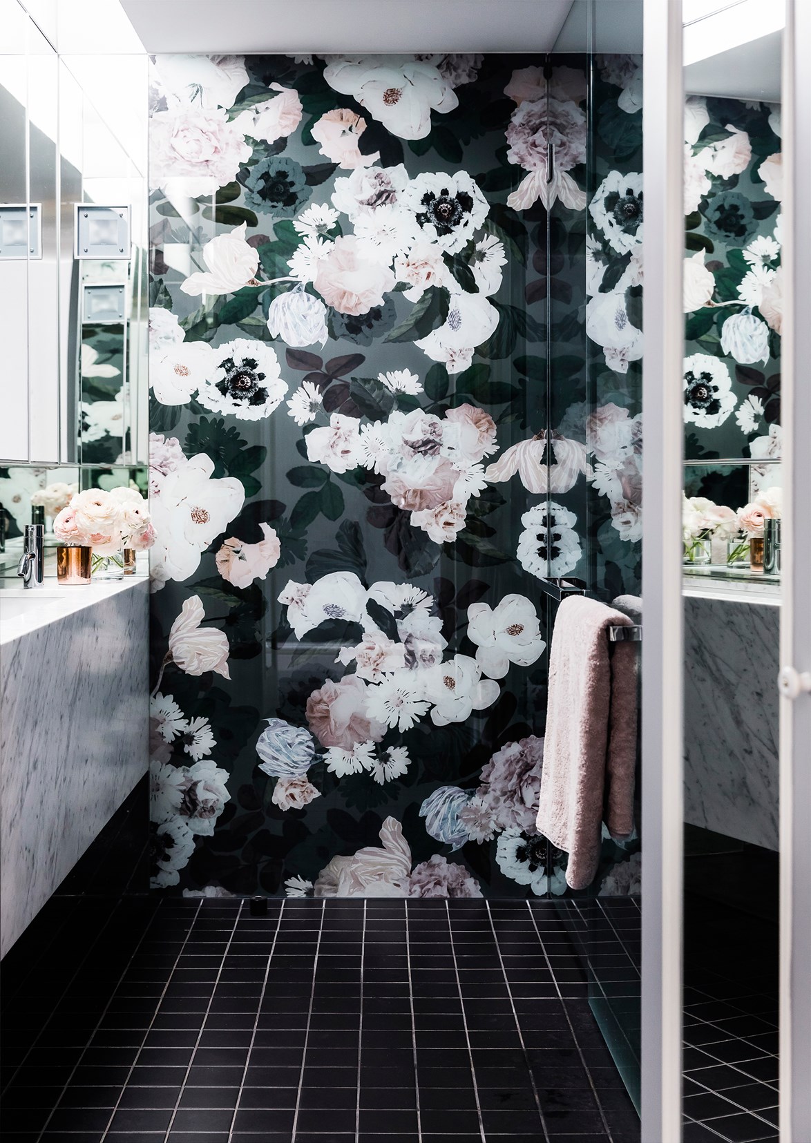 Although not technically wallpaper, this 'wallpaper-inspired' printed glass feature in a [Sydney florist's home](http://www.homestolove.com.au/the-renovated-sydney-home-of-florist-sean-cook-4711) is an excellent innovation, creating a functional, water-proof focal-point fit for a luxurious bathroom. *Photo: Maree Homer / Australian House & Garden*