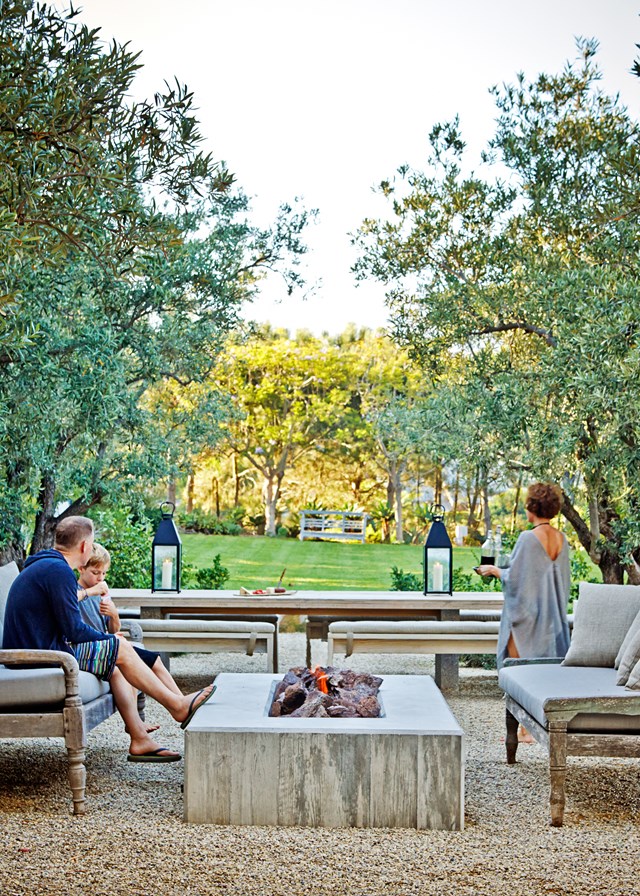 Italian farmhouse. Californian beach house. Bit Scandi. Bit Belgian. An interior designer creates an organic fusion of styles, while bringing outdoors in. This fireplace doubles as a table in this outdoor entertaining area at an [effortlessly chic mountain retreat](https://www.homestolove.com.au/an-effortlessly-chic-mountain-retreat-4757|target="_blank").