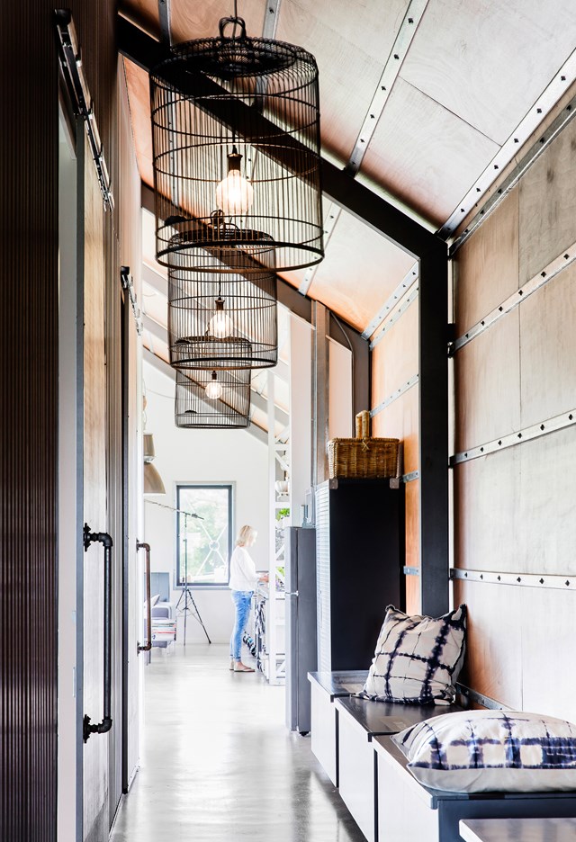 After a fuss-free design with open-plan living spaces that made the most of the property's spectacular views over a golf course to the ocean beyond, the owners of [The Shed in Gerroa on the NSW South Coast](https://www.homestolove.com.au/shed-conversion-how-to-build-a-stylish-holiday-house-for-less-4882|target="_blank") opted for a modern barn style design with an industrial aesthetic when building their dream holiday home.