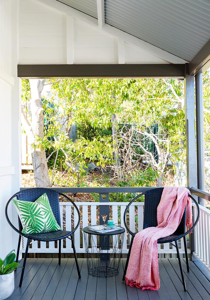Dark outdoor furniture makes updating with accessories easy and affordable.