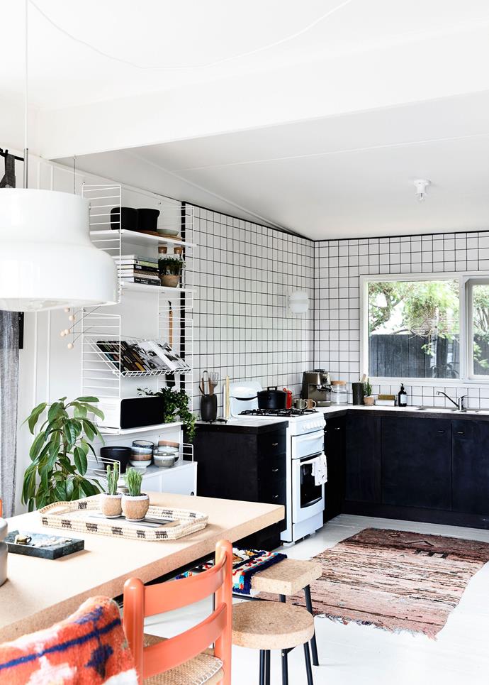 Moroccan-inspired textiles and an abundance of greenery combined with Scandinavian style furniture add a homely feel to this otherwise-minimalist space. Photo: Derek Swalwell