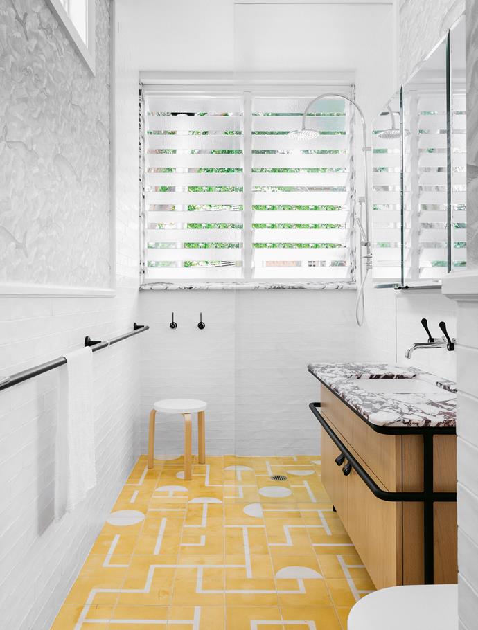 The guest bathroom is rendered in a more playful palette. Popham Brasilia Yolk and Milk floor tiles, [Onsite Supply+Design](http://www.onsitesd.com.au/|target="_blank"|rel="nofollow"). Cole & Son Whimsical Collection Melville wallpaper, [Radford](https://www.radfordfurnishings.com.au/|target="_blank"|rel="nofollow").