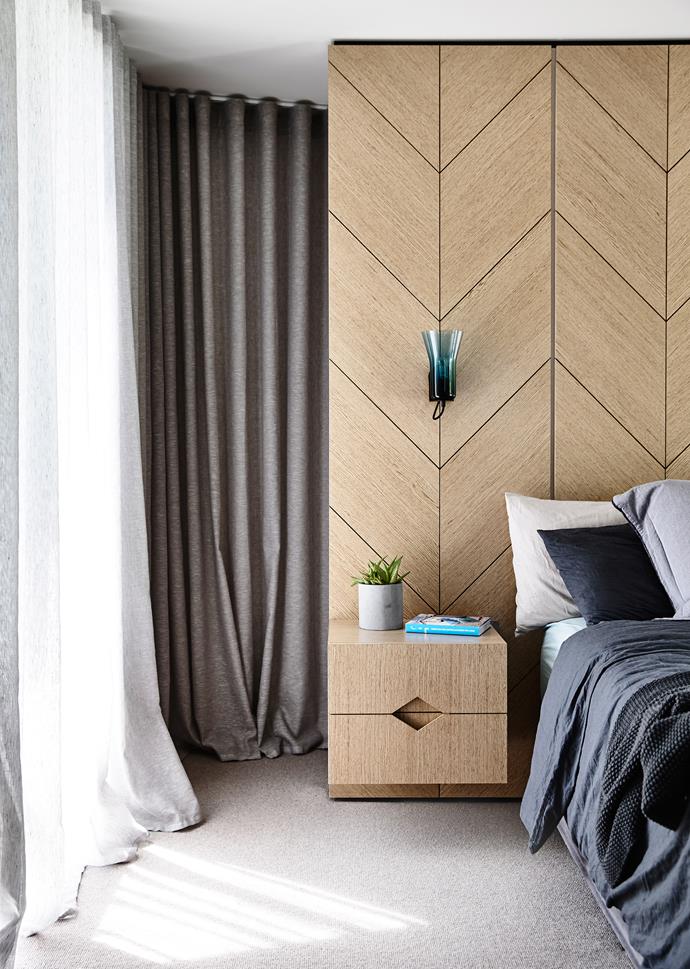 “The aim with the joinery was to provide a highly decorative aesthetic, wide-scope details, colour blocking and the repetition of pattern and geometric elements,” says Mardi Doherty. Cream wood veneer in the master bedroom from Slice Veneers.