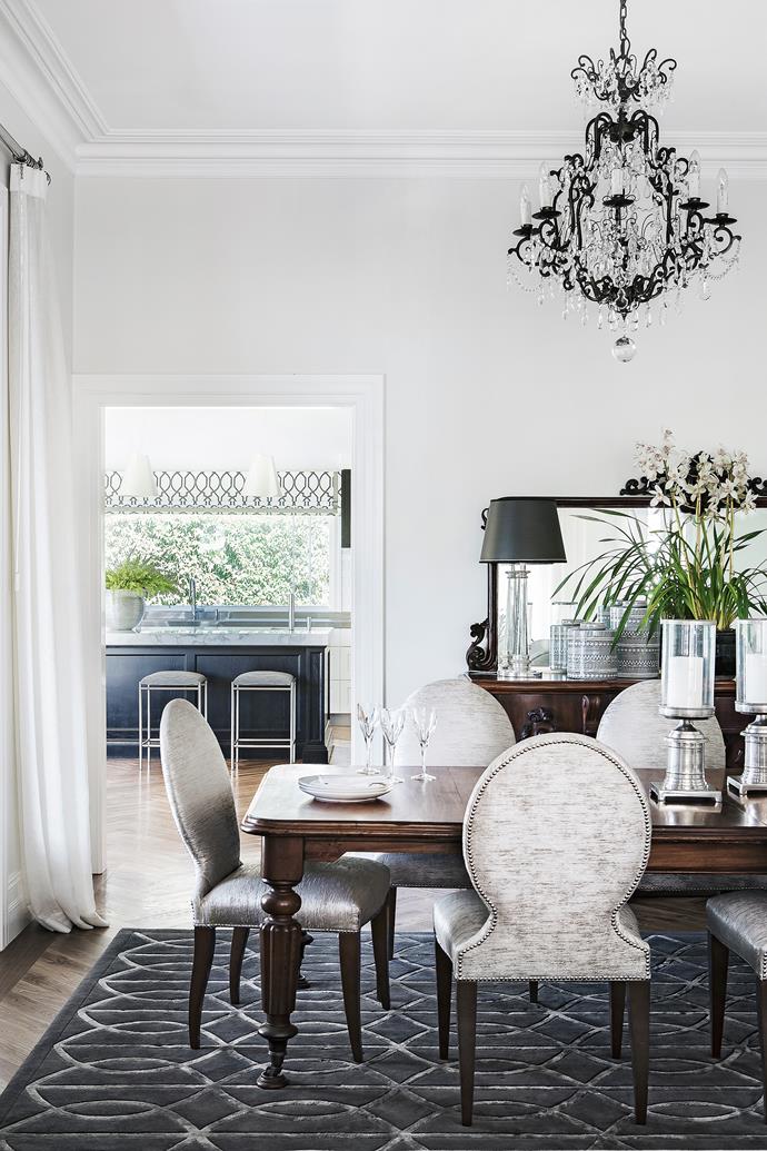 In this silver-themed space, the chair fabric sets the tone. Anna’s antiques take centrestage on the table and sideboard. A custom rug from Highgate House ties it all together.