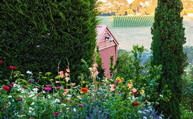 A formal cottage garden filled with earthly delights