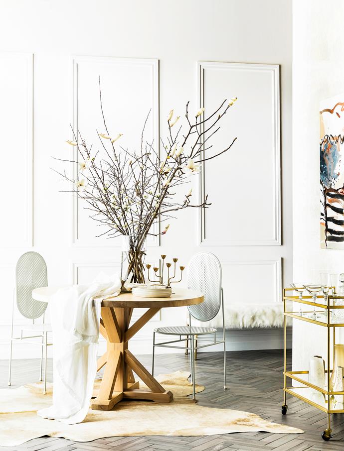 Warm whites paired with gold and timber accents, creates a chic, timeless and inviting aesthetic.