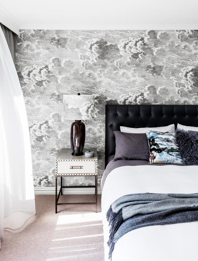 The sky view is echoed in the master bedroom by the wispy windblown clouds on the Cole & Son Fornasetti 'Nuvolette' wallpaper and lampshade fabric from Radford Furnishings.