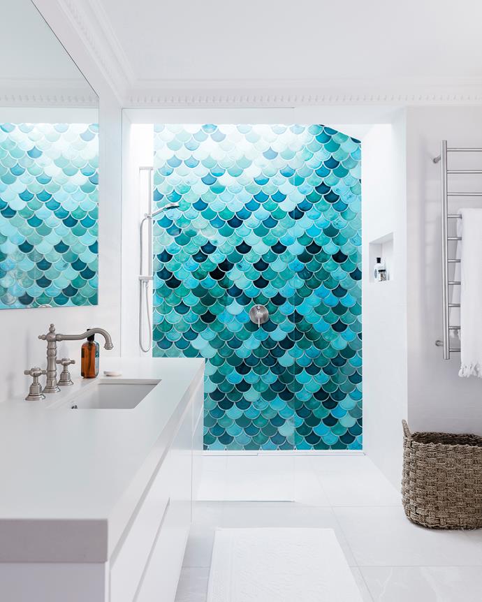 "These tiles are all individual – they don't come on a mat or anything. We created a random pattern and got our tiler to replicate it," Lana says.