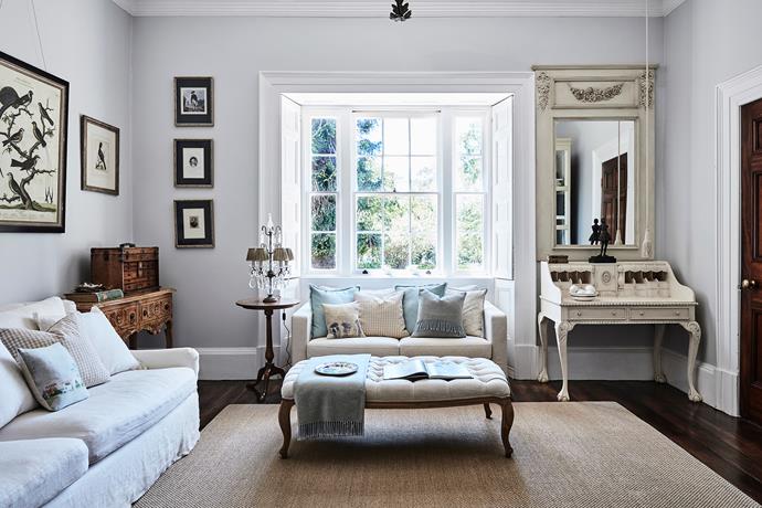 Vintage artworks add to the property's charm. The ornithological prints, part of a series by 18th-century naturalist George Edwards, were sourced online. The small portraits on the adjacent wall are of Governor Arthur Phillip and his descendants. A simple two-seater sofa from Ikea is dressed 
with a custom slipcover from Bemz.