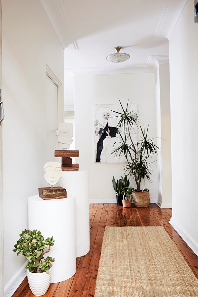 "I've always had a minimal '70s vibe going on," says [jewellery designer Holly Ryan](https://www.homestolove.com.au/jewellery-designer-holly-ryans-sydney-home-6569|target="_blank") of her interiors style. "There's lots of plants and record players, and heaps of art; I'm really obsessed with German pottery," she adds, It's this blend of old and new and abundance of art that give's Holly's home a wonderfully eclectic vibe.