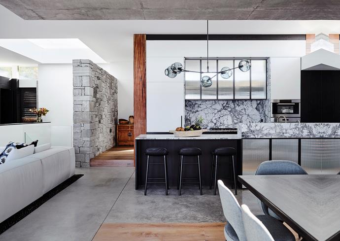 Benchtop/island bench/splashback: Honed Concordia stone from Artedomus. Flooring: Polished concrete and reclaimed French oak boards. *Photo: Anson Smart*