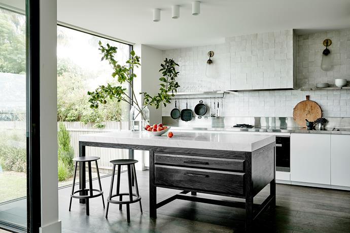 Benchtop/island bench: Honed Carrara marble with custom stainless steel on rear bench, both from Marable Slab House. Splashback/wall finish: Handmade 'Casa' Moroccan tiles in White from Onsite. *Photo: Will Horner*