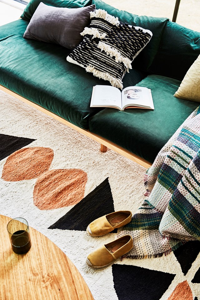 Mixing and matching textile fabrics, colours and patterns will instantly warm a rental space - and make it uniquely yours.