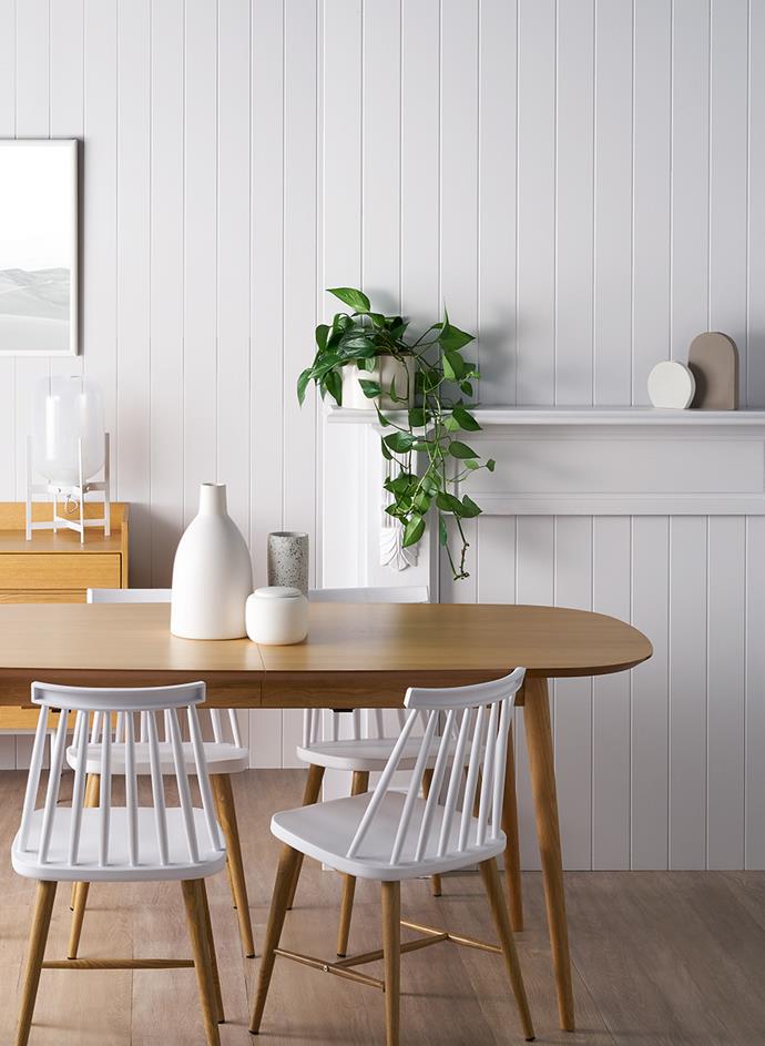 Create an interior statement by mixing nature-inspired textures with all-white walls. This dining room is painted with Taubmans Brighton Mist. *Image: Supplied*