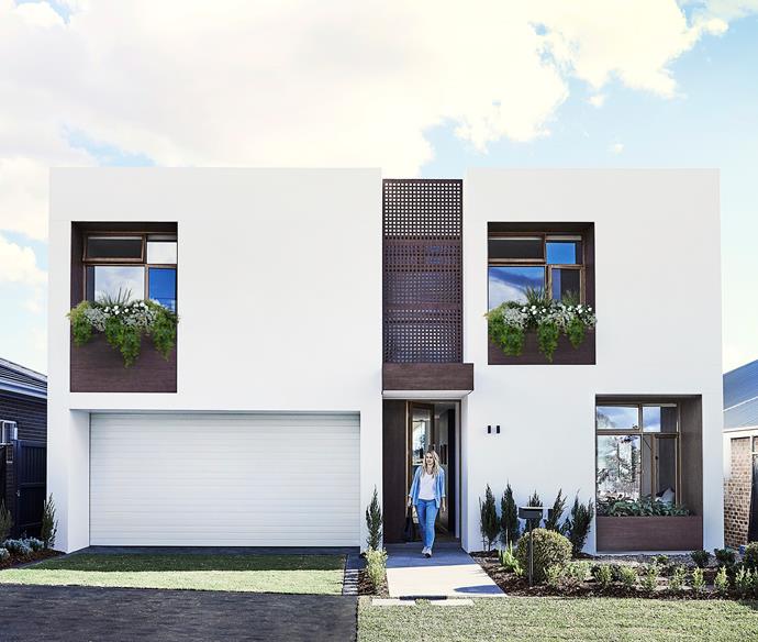 My Ideal House is constructed from thermally efficient Hebel and punctuated with cheery windowboxes made from Innowood. The automated double garage door is from B&D Australia.