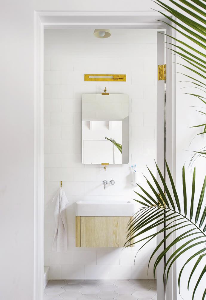 **Ensuite** Andrea and Adam's bathroom is simple but functional.