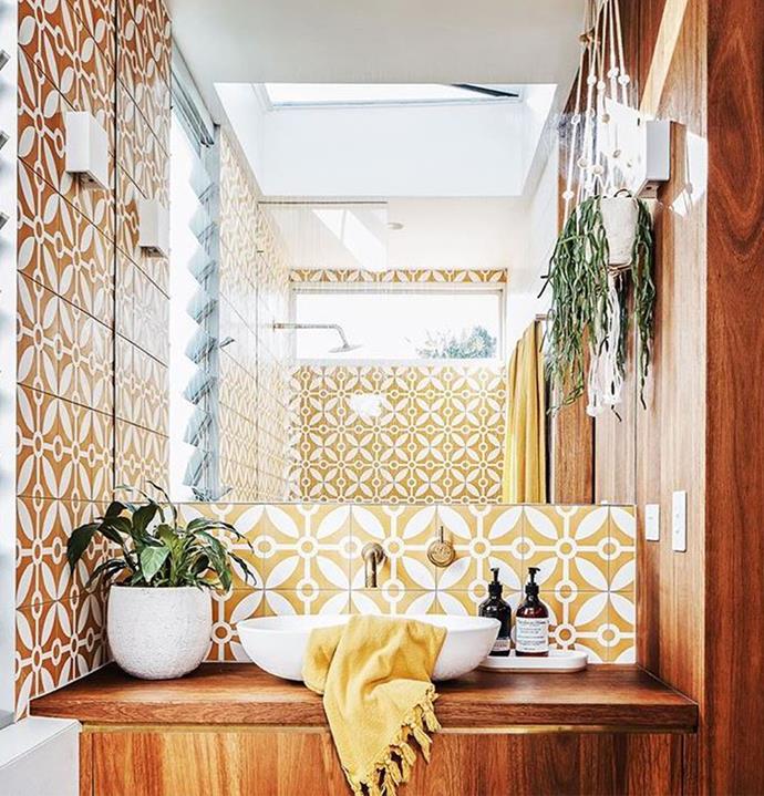 Style-savvy Shelley dreamt up the design of her beautiful bathroom featuring patterned feature tiles in her signature sunshine yellow from Jatana Interiors, custom timber cabinetry and gorgeous Sussex Scala Living Tumbled Brass Sink Mixer, from Reece.