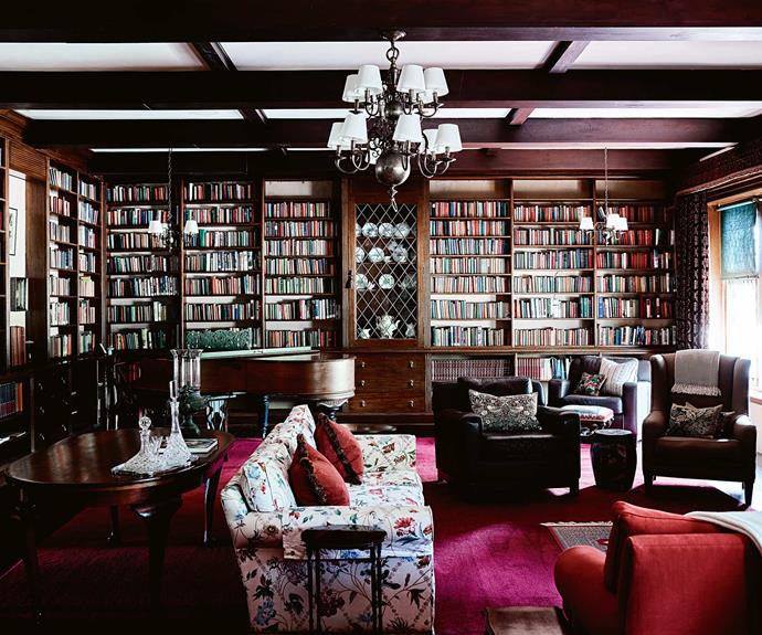 The [home library](https://www.homestolove.com.au/best-home-library-designs-3504|target="_blank"), with room for 5000 books, was built in 1927 and retains original curtains and light fittings. It's one of Peter and Andrew's favourite rooms in the house.