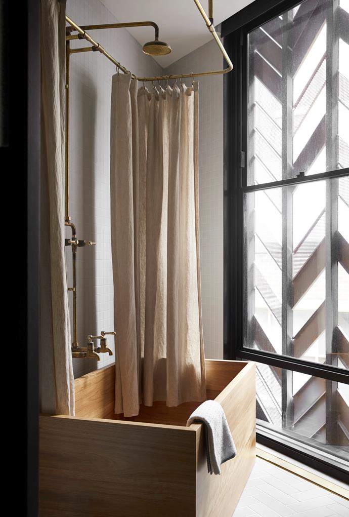 Some rooms feature a Japanese-style timber bathtub, handcrafted in Australia. *Photo: Sharyn Cairns*