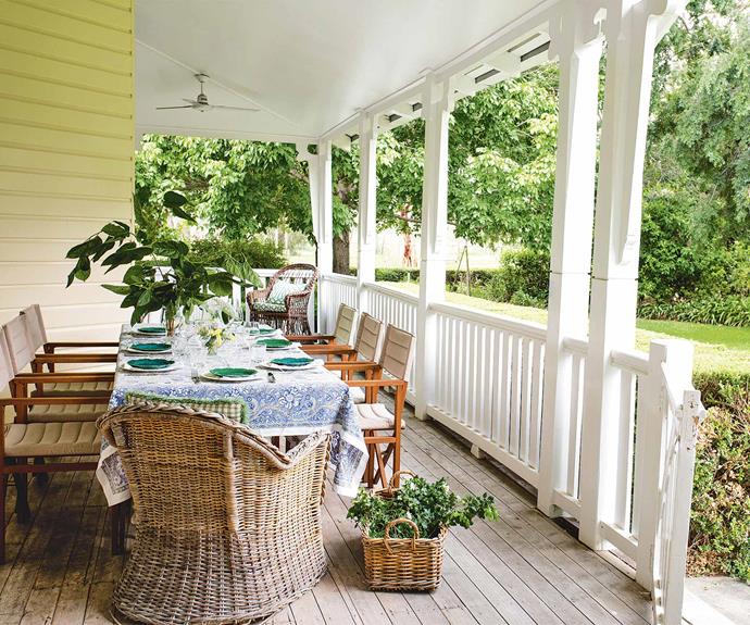The [spacious verandah](https://www.homestolove.com.au/country-verandahs-13365|target="_blank") is often set for social gatherings. "We took our time to live here as a family before putting our stamp on it," says Gina.