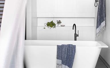 A calming white bathroom with contemporary coastal feel