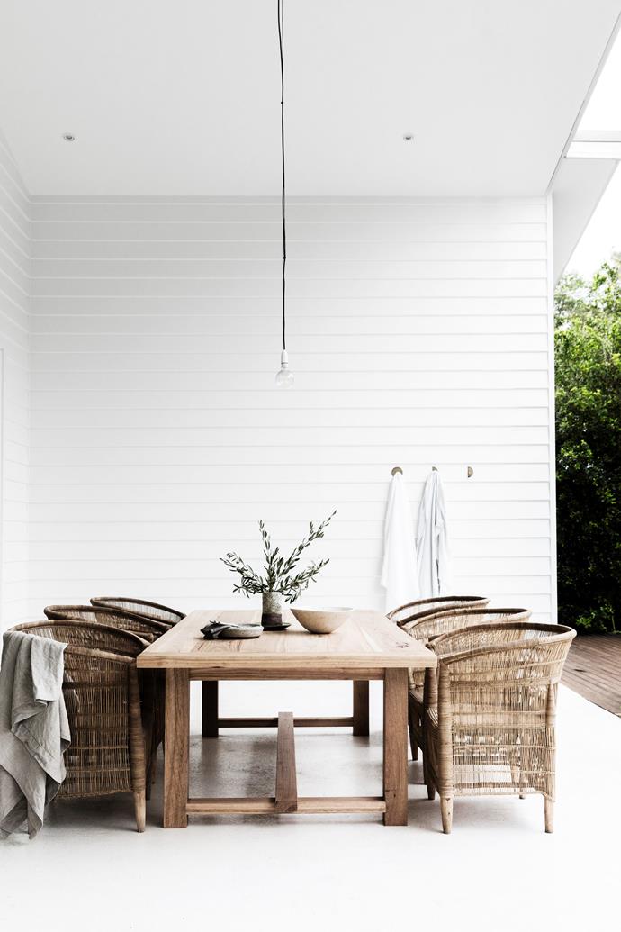 Family and friends regularly kick back around the outdoor table by Sheoak Design on chairs from MCM House. The [Pop & Scott](https://www.popandscott.com/|target="_blank"|rel="nofollow") wall hooks will hold towels when the pool is built, hopefully in time for summer!