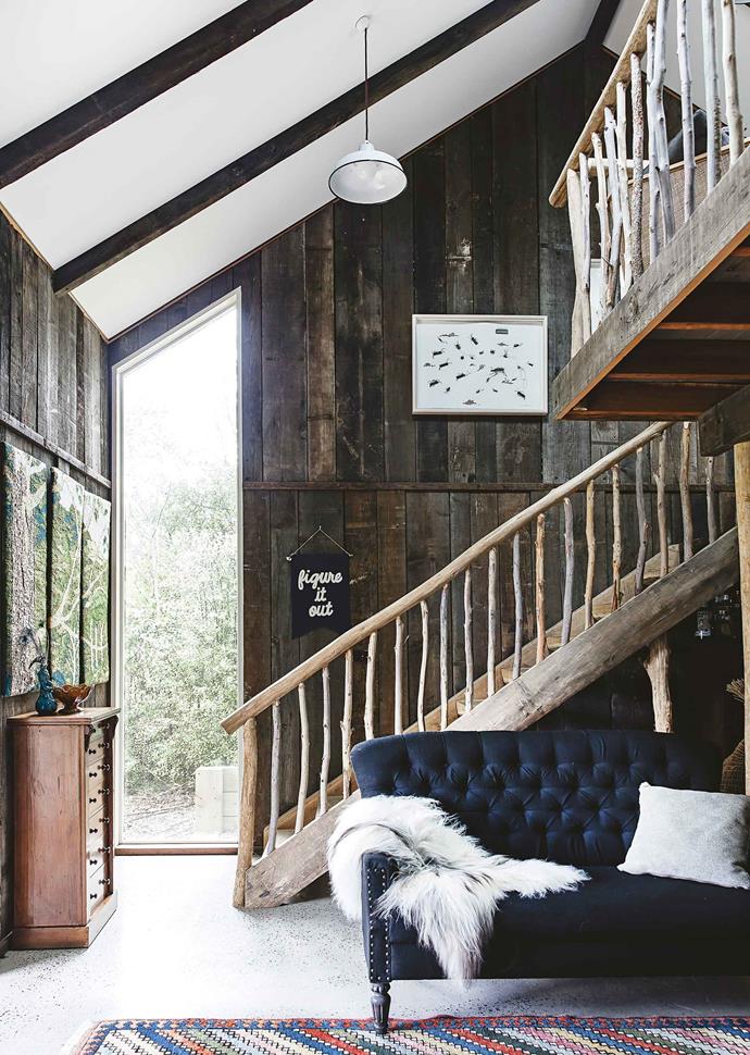Balustrades and railings were made from branches sourced on the property, with salvaged 80-year-old Oregon boards lining the walls.