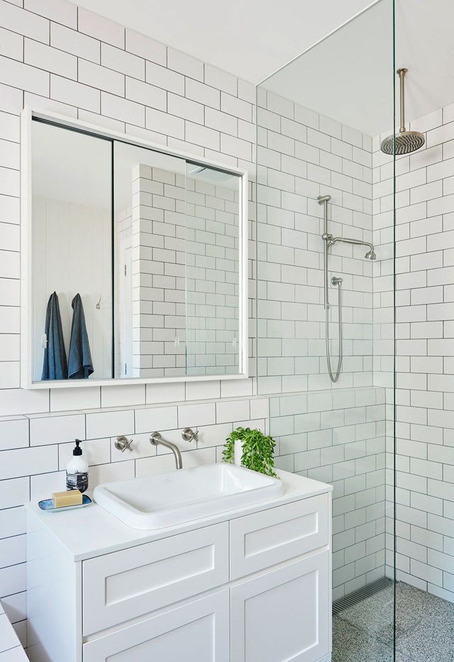 Classic meets trendy in the main bathroom of a [refreshed Californian bungalow](https://www.homestolove.com.au/a-clever-extension-refreshed-this-1920s-californian-bungalow-19106|target="_blank"). Terrazzo floor tiles have been paired with white subway tiles to create a family-friendly space that is easy on the eye.