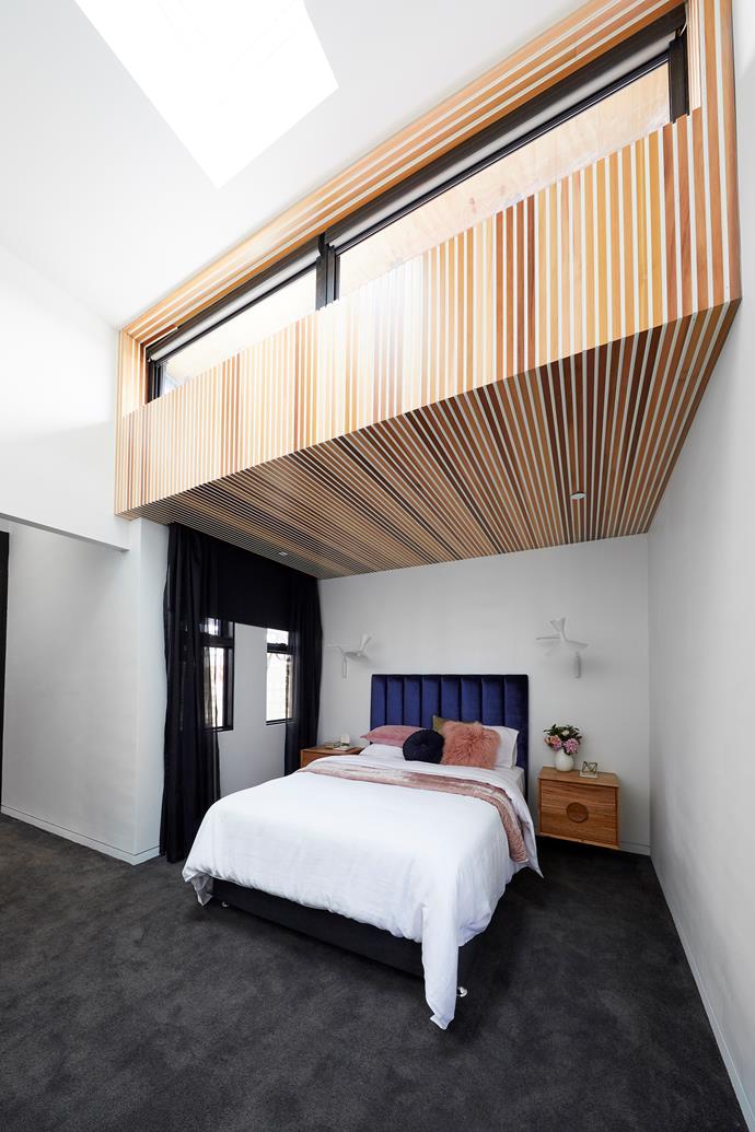 **First guest bedroom -** Repeating the stunning timber panelling on the ceiling of their guest bedroom set this space apart from the rest and won Bianca and Carla their first room reveal. Well deserved, we say!