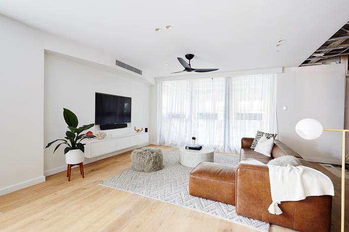 **Informal living room** - With so much space, Hans and Courtney were able to create an informal entertainment space within their open plan dining and living room. While the judges were big fans of the idea, [buyer's advocate Frank Valentic](https://www.homestolove.com.au/the-block-2018-buyers-advocates-react-to-the-gatwick-apartments-19026|target="_blank") wasn't so sure how functional the side-by-side living rooms would be for his clients.