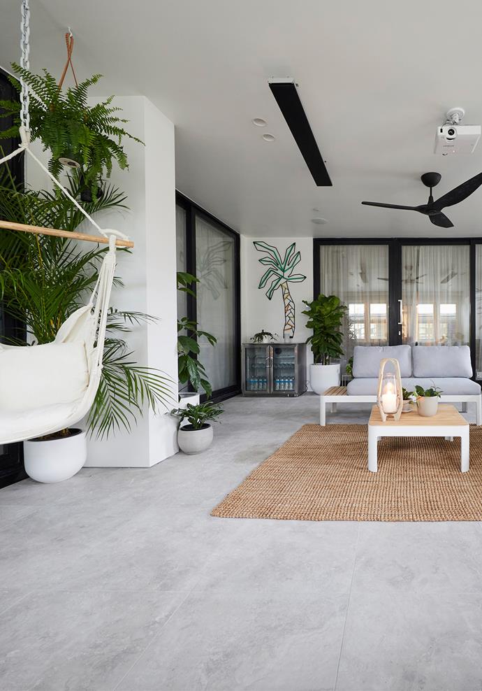 **Outdoor terrace** - The [outdoor room](https://www.homestolove.com.au/inviting-outdoor-room-ideas-19144|target="_blank") was a hit with Darren, who found the space bright, refined, and tropical but Shaynna and Neale were unconvinced. While we loved the style of the room, we agree with Shaynna that a pop of colour somewhere would have lifted the space tremendously.