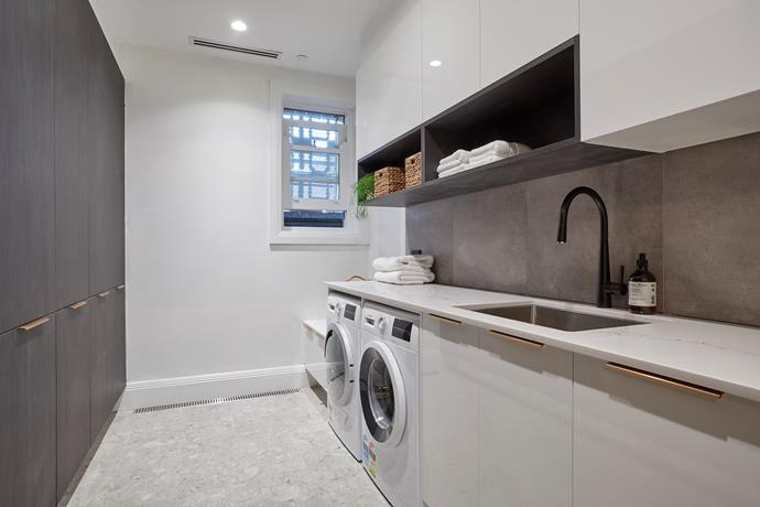 Hayden and Sara's [laundry featured a clever layout](https://www.homestolove.com.au/the-block-2018-room-reveal-hallway-shannon-vos-19048|target="_blank") and beautiful finishes - but was unfortunately not finished by tools down. A bad bout of 'man flu' and a 20 minute water leak were blamed by the couple for their inability to complete their rooms.