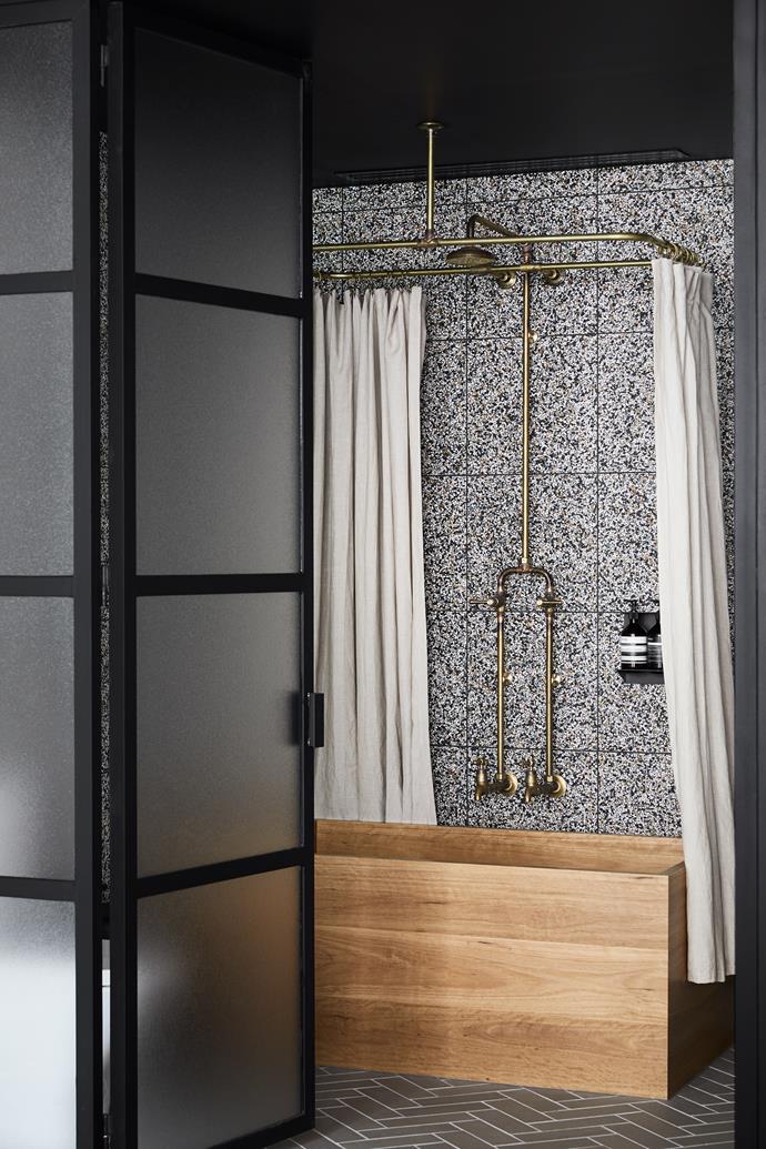 Want to add an industrial touch to your bathroom? Think about installing exposed pipes in brass or copper. Or a pipe shower rail will give you the same look without the plumbing work. *Photo: Sharyn Cairns*