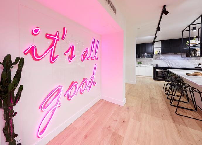 While Jess and Norm's neon light feature wall sure made a lasting impression, we can't help but think it was a *huge* waste of space. A bar or beautiful custom console would have been a perfect fit for this recessed nook and they still could've included their neon sign above it, just on a smaller scale.