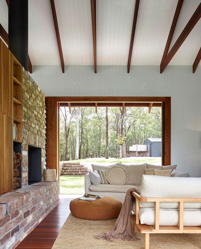 **'Branching out' by [Shaun Lockyer Architects](http://lockyerarchitects.com.au/|target="_blank"|rel="nofollow"):** This Moreton Bay hinterland home is owned by tree-changers, who requested a modest, sustainable and inviting living space. Architect Shaun Lockyer has delivered. His breezy pavilion offers a strong visual connection to the landscape, is intimate in size (though not in height; the raked ceiling ensures the space doesn't feel constricted), and features tactile and robust recycled materials. The fireplace is the centre of activity on cold winter nights, but also acts as a room divider that sets the scale for the rest of the house. *Photo:* Scott Burrows Photography