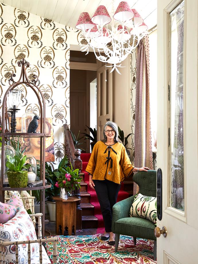 Como by Design is the brainchild of interior designer Tigger Hall, who is pictured here in the upstairs walk-through she created as part of the event. Her space features a harmonious layering of upholstered cushions and fun fabrics.
