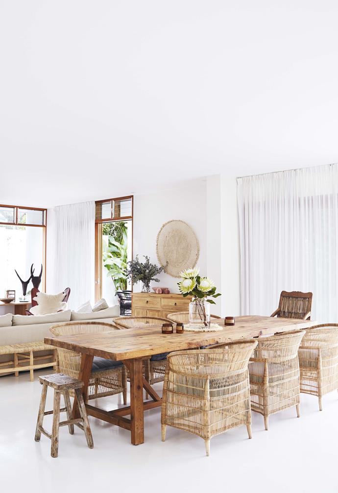 **Dining** The recycled timber farmhouse table, bench, side table and sideboard, all from Bisque Interiors, create a relaxed holiday vibe. A circular woven artwork from Pampa offers a soft, earthy contrast to the walls painted in [Dulux](https://www.dulux.com.au/|target="_blank"|rel="nofollow") Vivid White.