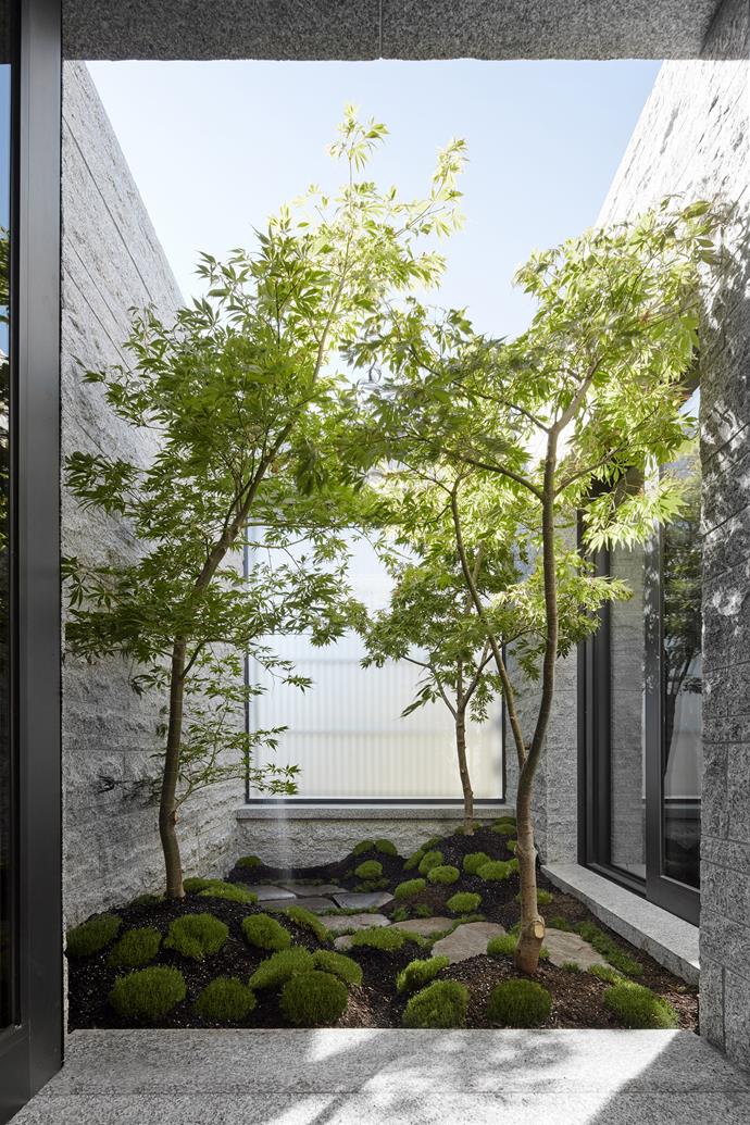 The bathroom opens out onto its own Japanese-style courtyard.