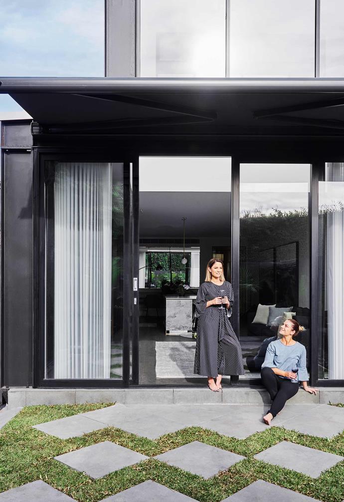 **Courtyard goals** The [living room](https://www.homestolove.com.au/20-best-open-plan-living-designs-17877|target="_blank"|rel="nofollow") opens to an intimate courtyard that is perfect for entertaining. Sheer curtains from Luxaflex provide the option of privacy should the residents so choose. The pavers in the courtyard are laid in a way that naturally draws the eye and adds personality to the space.